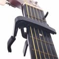 Miniatyrbillede 1 af 3: Guitar Capo