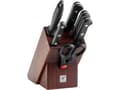 Miniatyrbilde 2 av 2: Set of 4 knives in a walnut block
