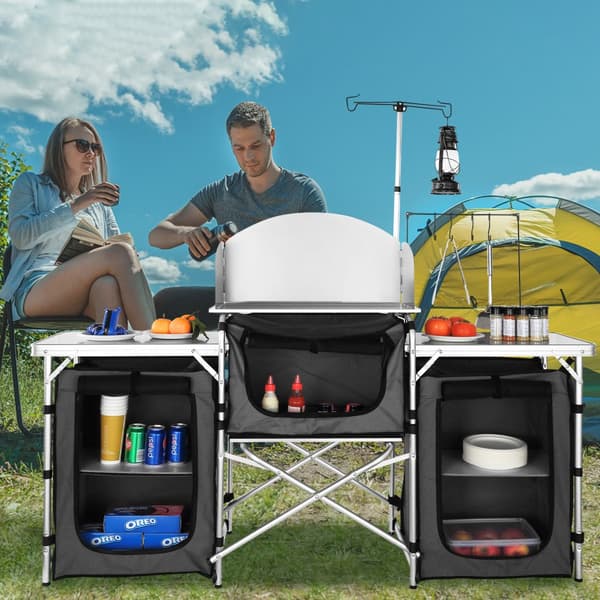 Kokoontaittuva camping-keittiöpöytä, alumiininen Cook Station 3 -kaappi, säilytyslaukku ja irrotettava tuulilasi.