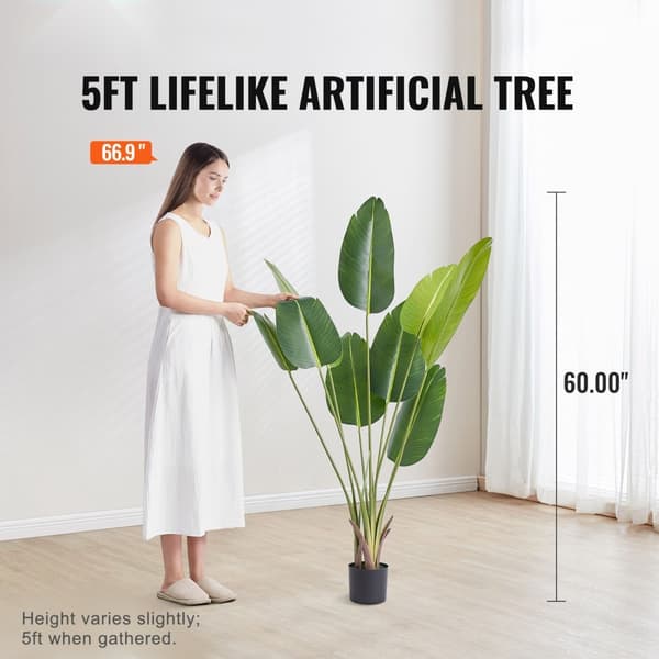 Kunstige paradisfugletræer, 1,5 m høje. Naturtro efterligning i PE-materiale. Lav vedligeholdelse til både indendørs og udendørs brug.