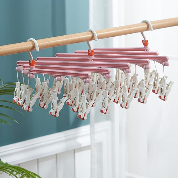 Käytännöllinen taitettava vaateripustin, jossa klipsit, 19 klipsiä, pinkki