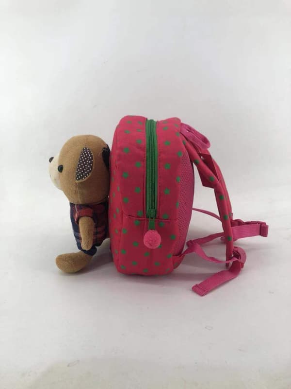 Lapsen reppu nalleturvahihnalla – pinkki