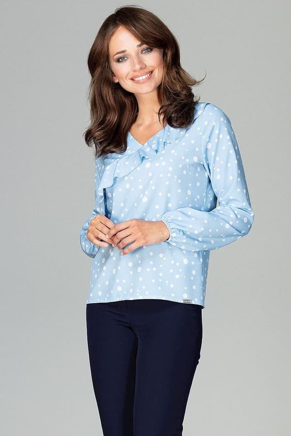Blus med volang