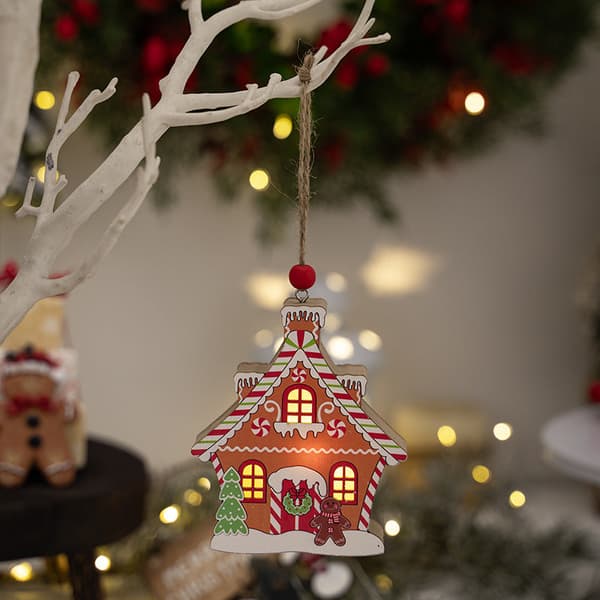 Hängande juldekoration pepparkakshus