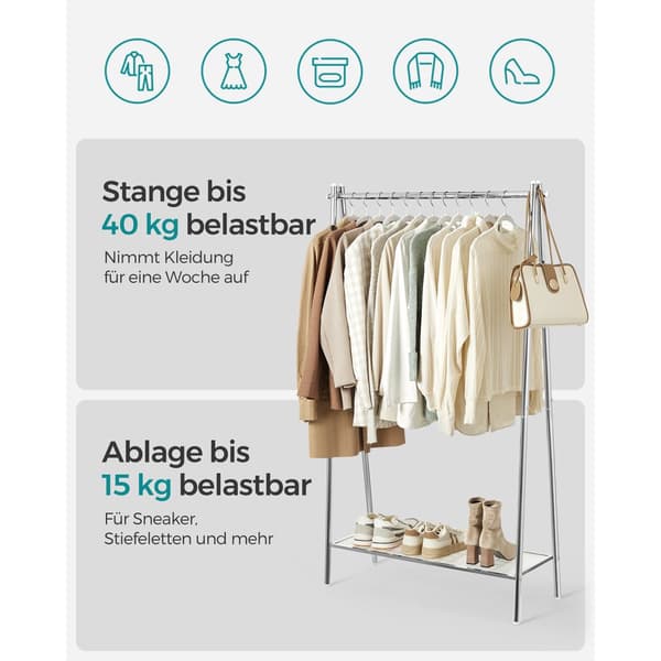 Teräksinen vaateteline hopeisella hyllyllä