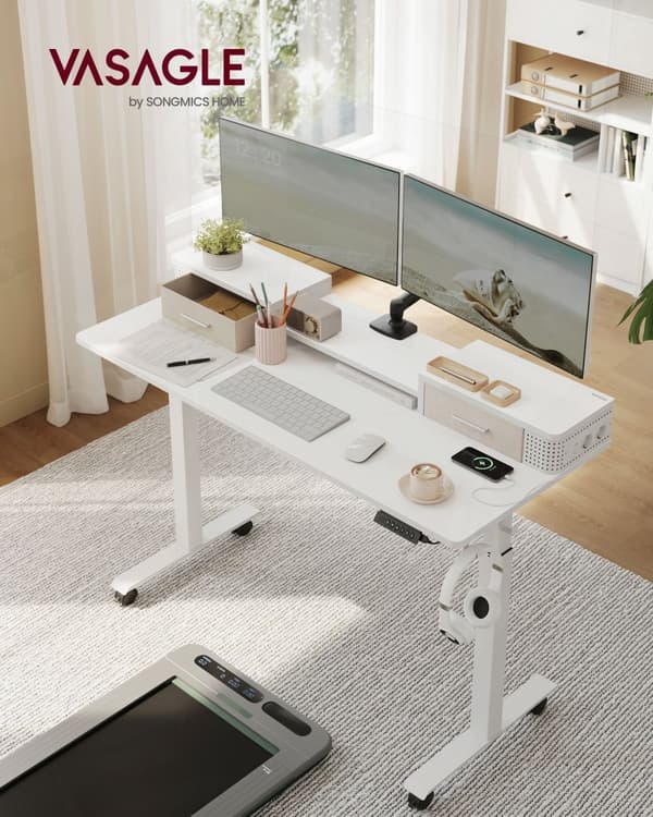 Höj- och sänkbart skrivbord och elektriskt molnvitt
