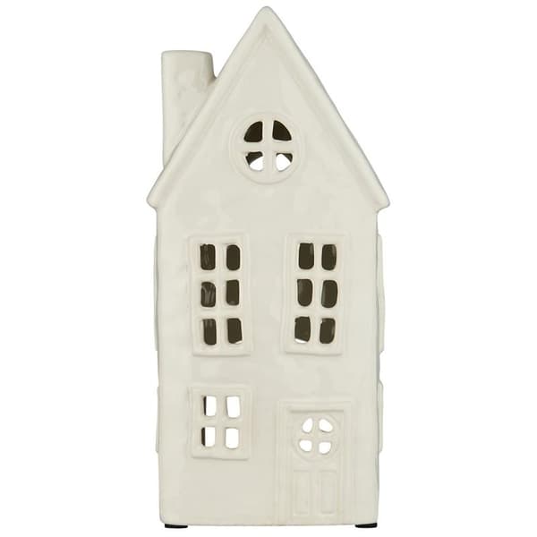 House with tea lights -  round window in gable