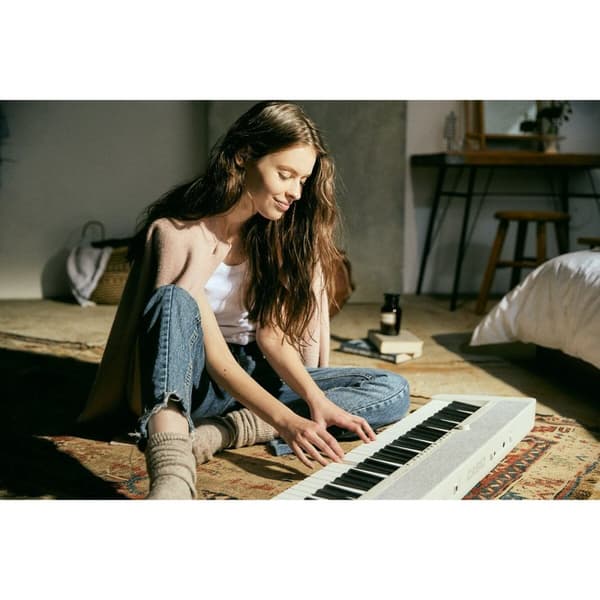Casio MU CT-S1 Tangentbord i Vit Färg - Lättanvänt och stilrent tangentbord för musikskapande.