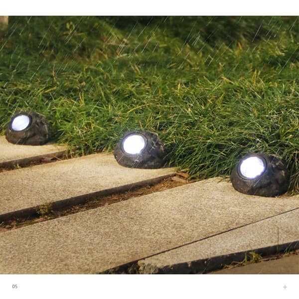 INF Solar Stone Light: Realistisk harpikshagedekor med energieffektiv LED