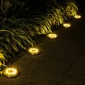 Miniatyrbild 2 av 8: Bomclap 12-Pack Solcellsdrivna Marklampor med 8 LED – Vattentäta Trädgårdslampor för Uteplats & Gräsmatta