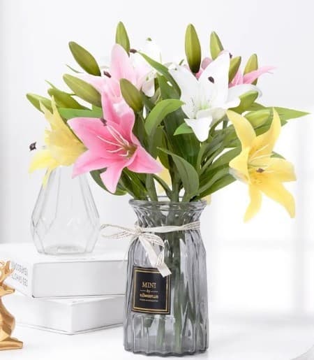 KONSTGJORDA BLOMMOR LILJEGRENAR SOM EN LIVSLILJEBLOMM