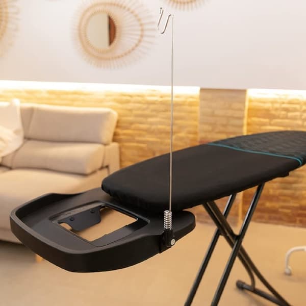 Cecotec Ironing board with a 110 x 33 cm ironing surface and plug socket.