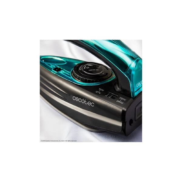 Cecotec 1200 W travel iron, 15 g/min continuous steam and 53 g/min steam burst. Dual voltage system.