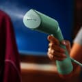Miniatyrbild 5 av 6: Handhållen ångkokare - PHILIPS - STH5010/70 - 1300 W - Vertikal ångning - Kontinuerligt ångflöde - Sladd: 2,5 m - Grön