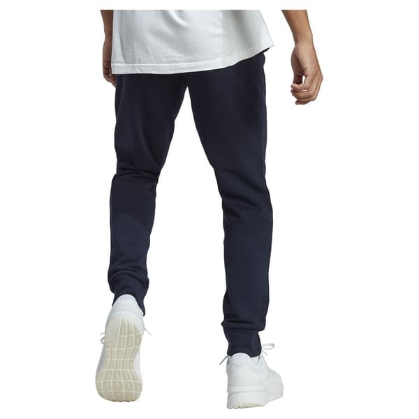 Adidas Byxor Essentials French Terry Tapered Cuff Logo Joggers Blå XS / Regular Man