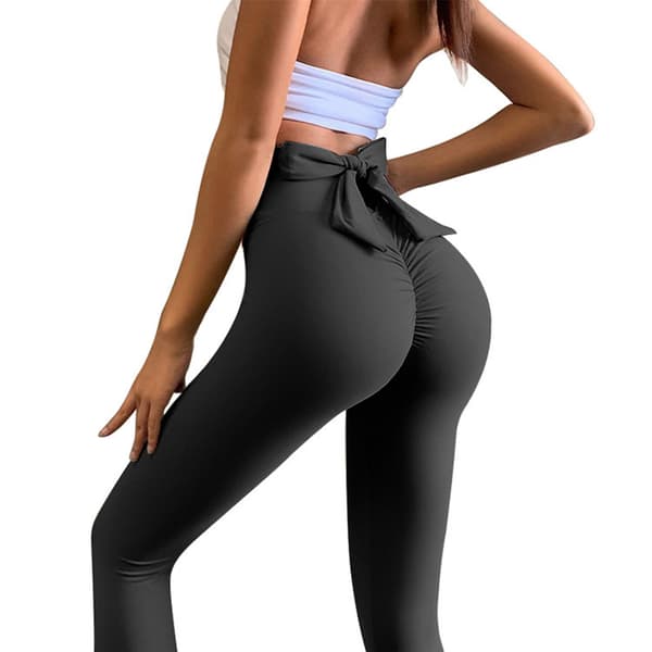 INF Högmidjade svarta yogabyxor med rosettdetalj  S