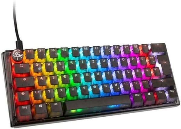 Välkommen till en värld av gamingexcellens med Ducky One 3 Aura Black Mini Gamingtangentbord, RGB LED! Svart