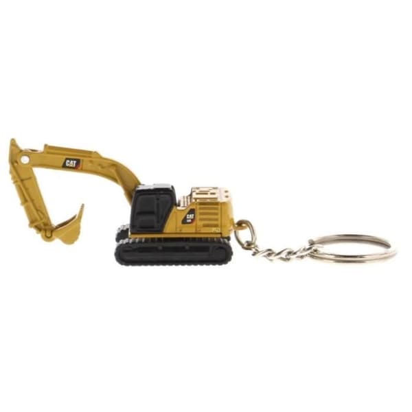 Nyckelring - CATERPILLAR - 320 - Gul - Metall och plast - Originaldesign i form av en spade