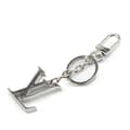 Miniatyrbilde 1 av 5: Pre-owned Louis Vuitton Stainless Steel LV Initials Key Holder And Bag Charm Silver