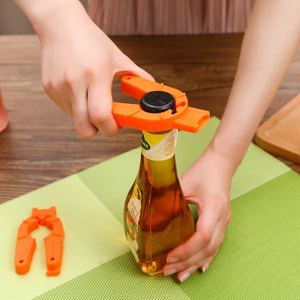 Monikäyttöinen kansi- ja purkinavaaja – ergonominen kahva, helppokäyttöinen, säädettävä koko, oranssi