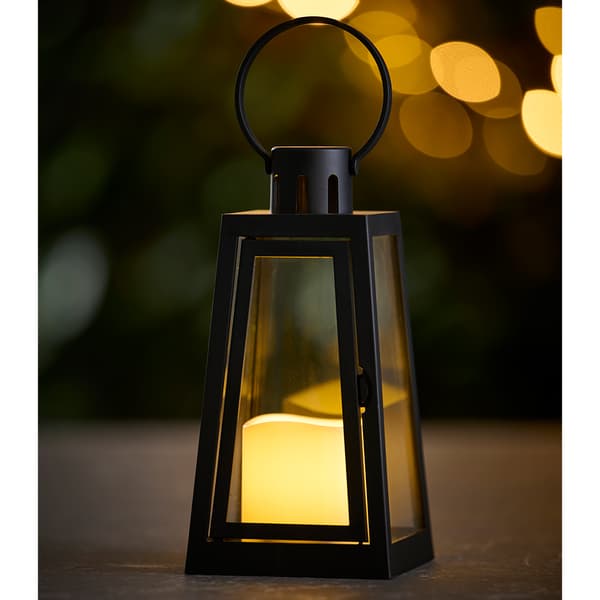 Lanterna med LED-vaxljus och timerfunktion