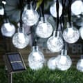 Miniatyrbild 1 av 5: Lollanda Ljusslinga utomhus, Solcellsbelysning 11 m – 60 LED Kristallkulor, IP65 Vattentät, 8 Lägen, för Terrass och Fest