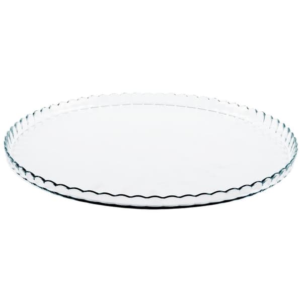 Stor glas-tallrik med dekorerade kanter för servering