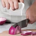 Miniatyrbilde 3 av 3: Enkel og sikker løkskjæring med praktisk holder