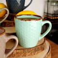 Miniatyrbild 5 av 11: Elegant set med dekorerade keramikkoppar i presentförpackning