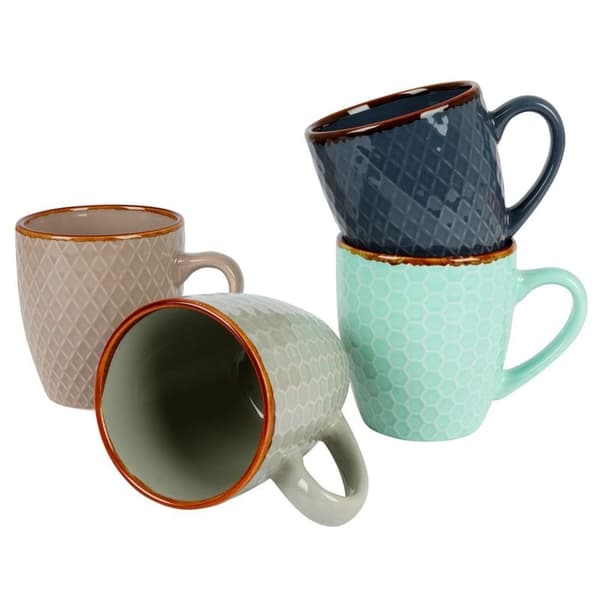 Elegant set med dekorerade keramikkoppar i presentförpackning
