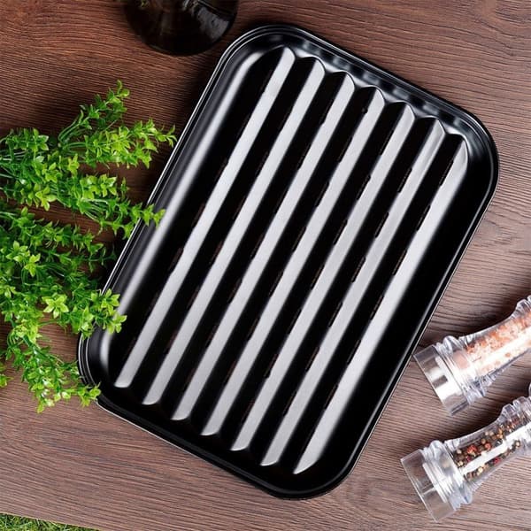 Tarttumaton rei'itetty grillilevy ympäristöystävälliseen grillaukseen