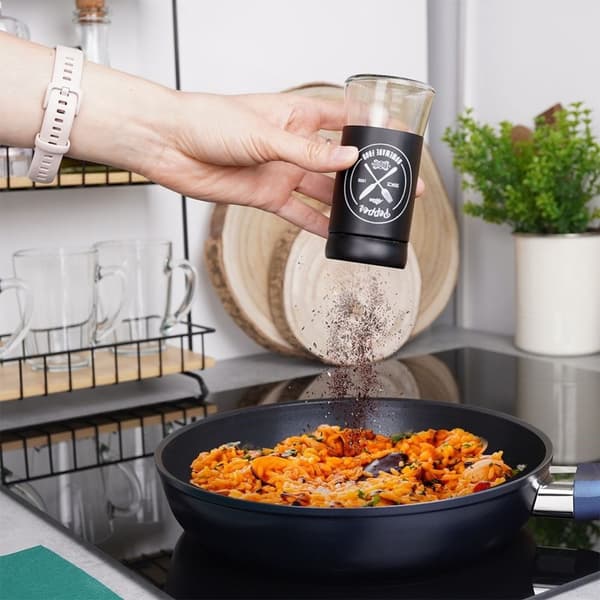 Elegant serveringsset i glas och svart metall för salt & peppar