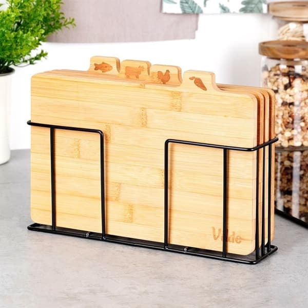 Set med bambuskärbrädor i metallställ med unik design