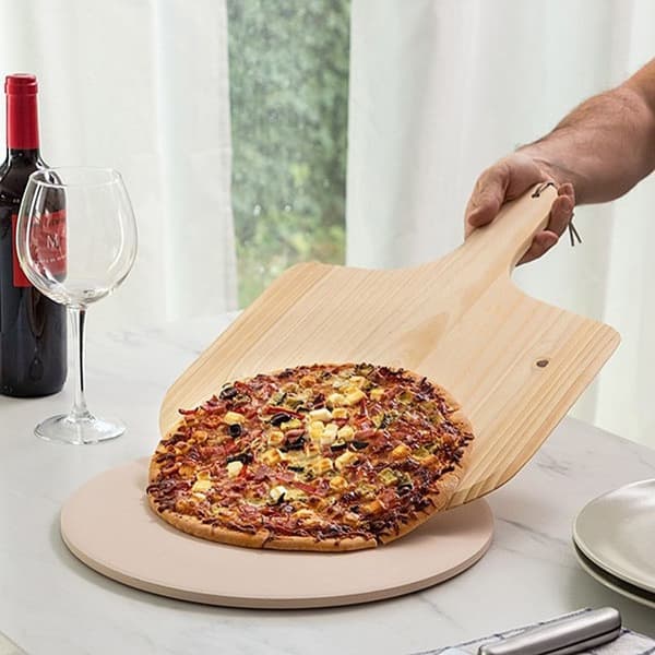 Pizzasett med stein, spade og kutter for perfekte pizzaer