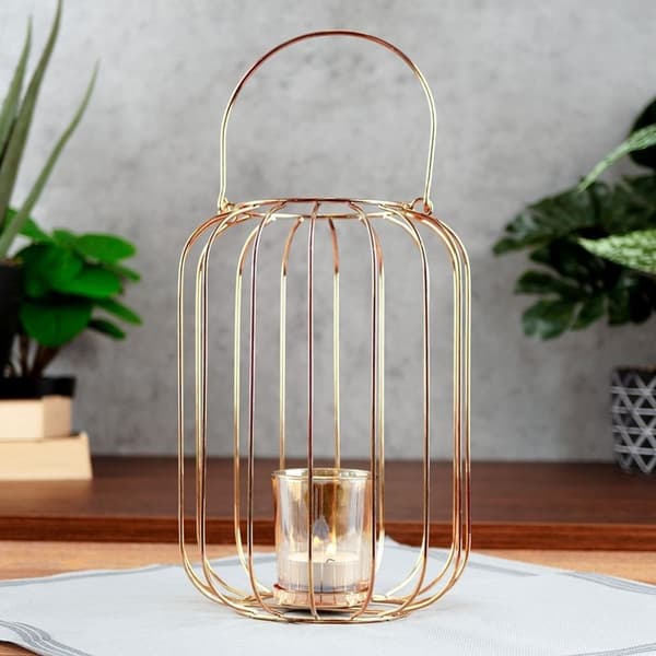 Elegant stearinlyslygte i metal og glas til stearinlys eller fyrfadslys