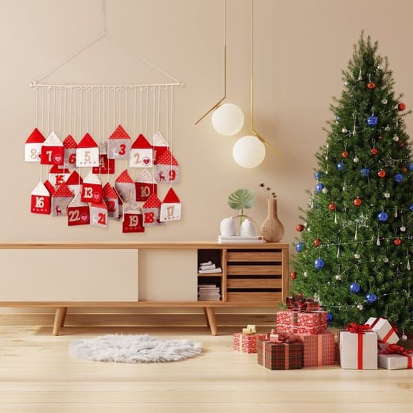 Adventskalender med 24 hus på träpinne
