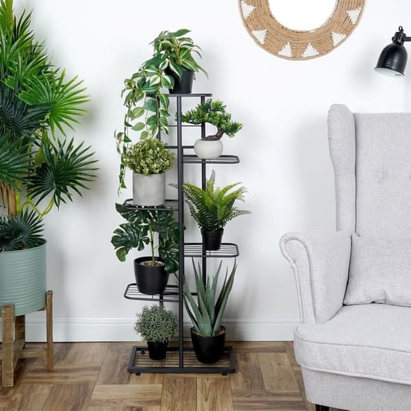 Sort metall blomsterpotte med seks nivåer for potter og dekorasjoner