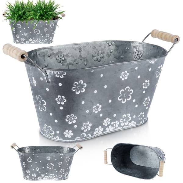 Avlång galvaniserad kruka med handtag och vita blommor