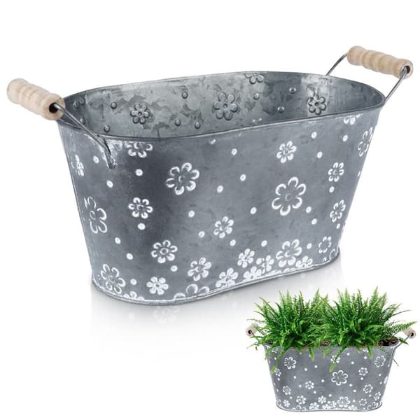 Avlång galvaniserad kruka med handtag och vita blommor