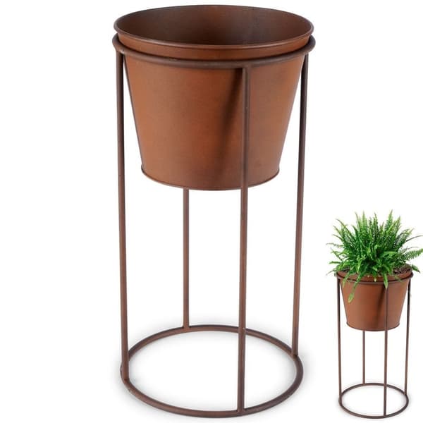 Blomsterpotte i metall på stativ med rusteffekt