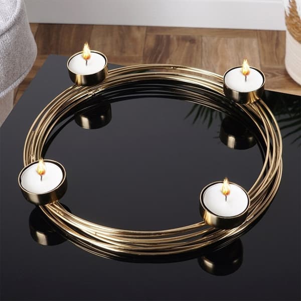 Lysestage i guld til fire fyrfadslys, industriel stil