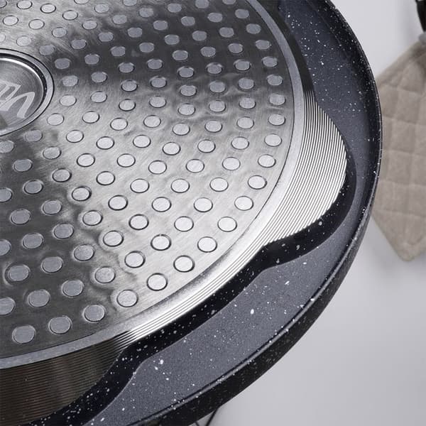 Graniittipaistinpannu 26 cm, 7 kasvojen muotoista reikää