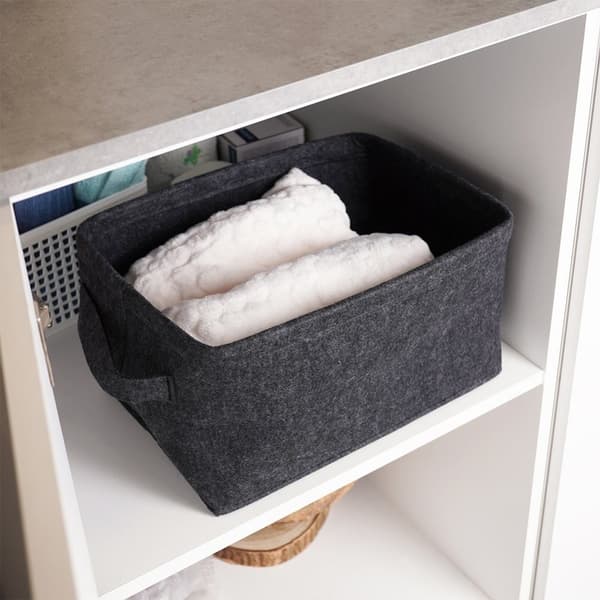 Oppbevaringskurv i svart filt med håndtak og sammenleggbar design