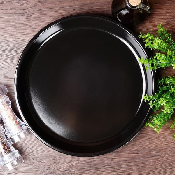 Rund grillplatta i stål med non-stick beläggning. Perfekt för grillning, köttbakning och bakning i ugnen.rund grillplatta, non-stick grillplatta, gril