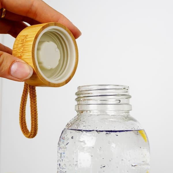 Trygg glassflaske med silikondeksel for drikkevarer