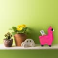 Miniatyrbilde 5 av 8: Lamme sparegris med solbriller