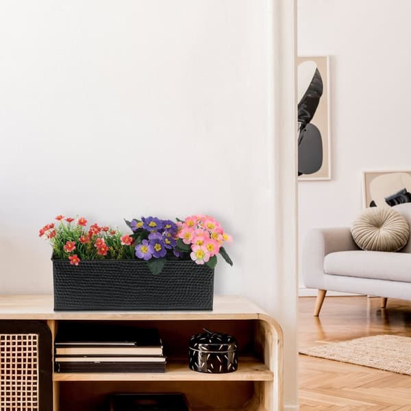 Blomlåda inomhus svart