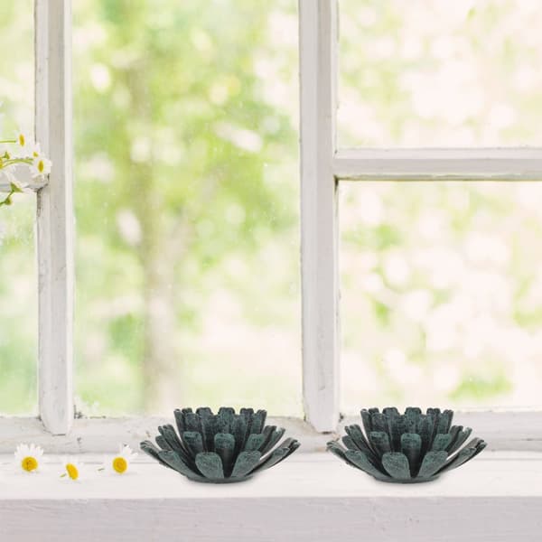 uppsättning med 2 blomformade värmeljushållare