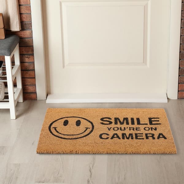 Kokosnøtt dørmatte "Smil du er på kamera"