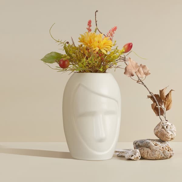 Ansigtsformet blomstervase